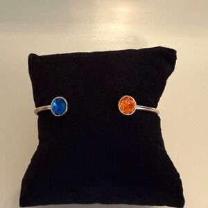 Elegant Silver Bracelet with Blue and Orange Stones